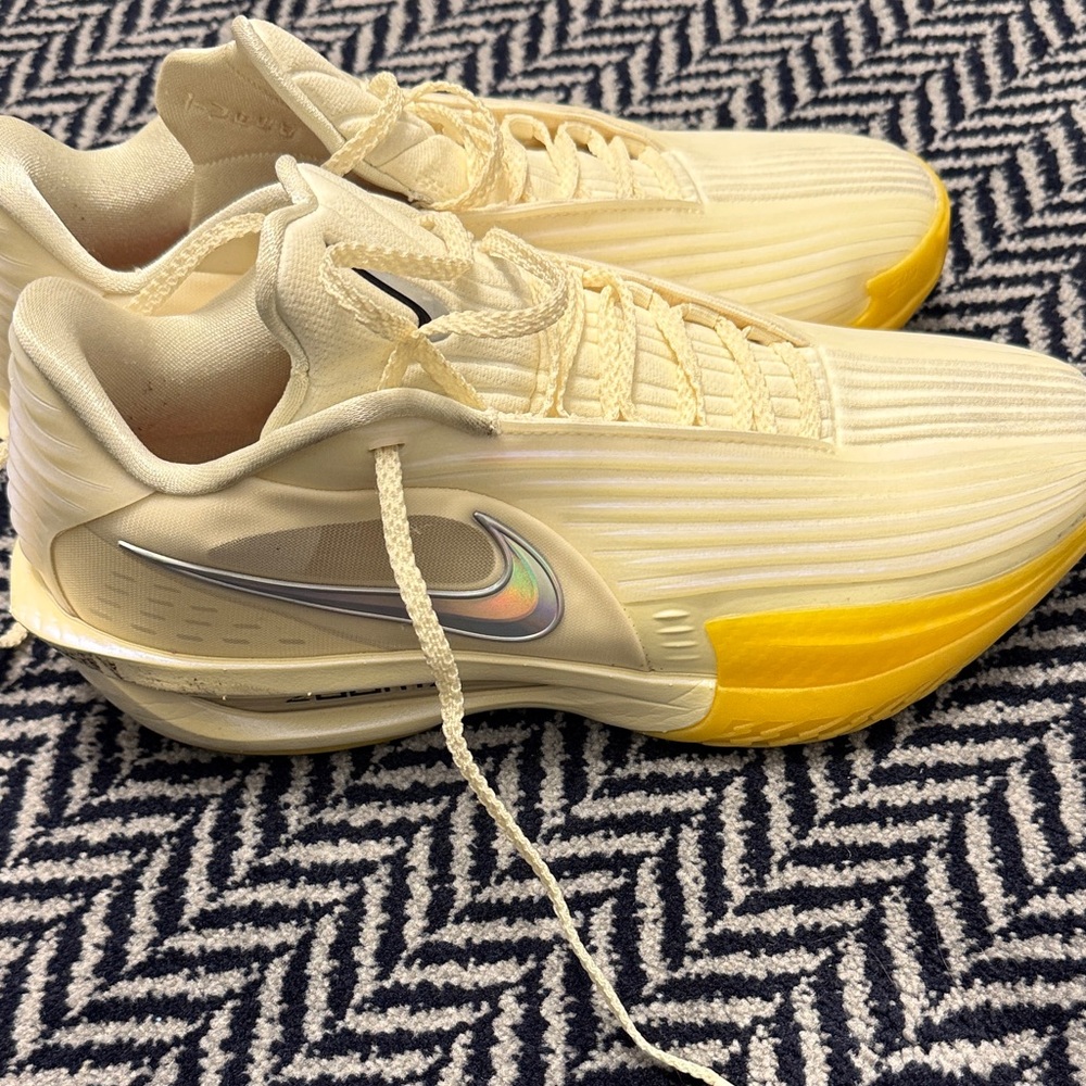Nike Cream and Yellow Tennis Sneakers with Iridescent Swoosh